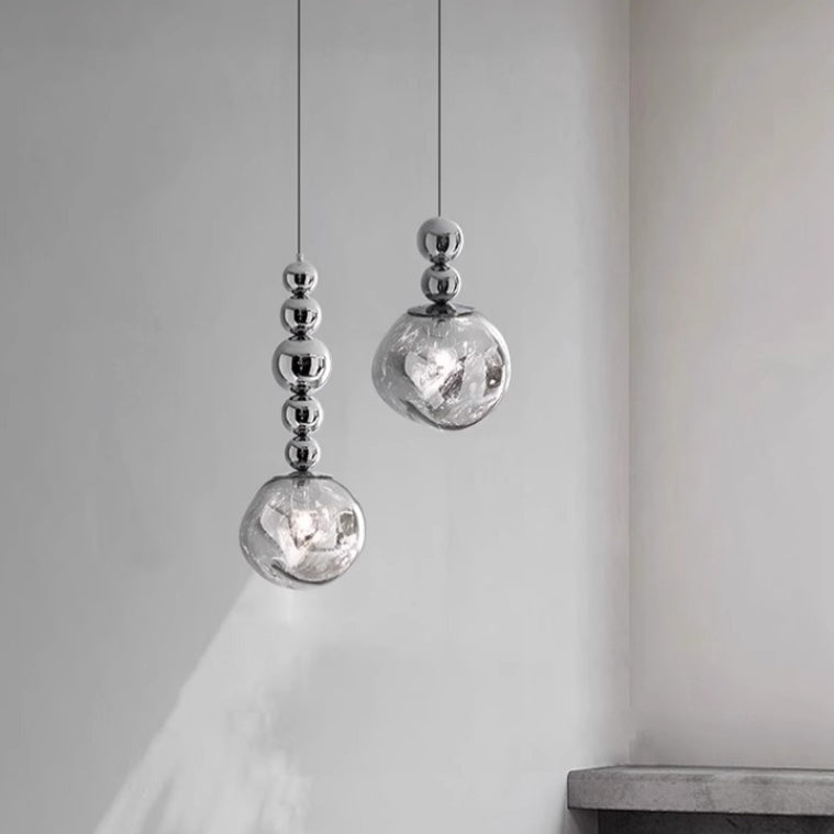 Lustre suspendu contemporain nordique rond boule de lave en fer et acrylique à 1 lumière pour salon 