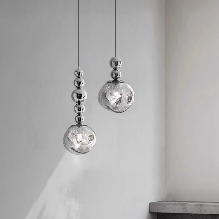 Lustre suspendu contemporain nordique rond boule de lave en fer et acrylique à 1 lumière pour salon 