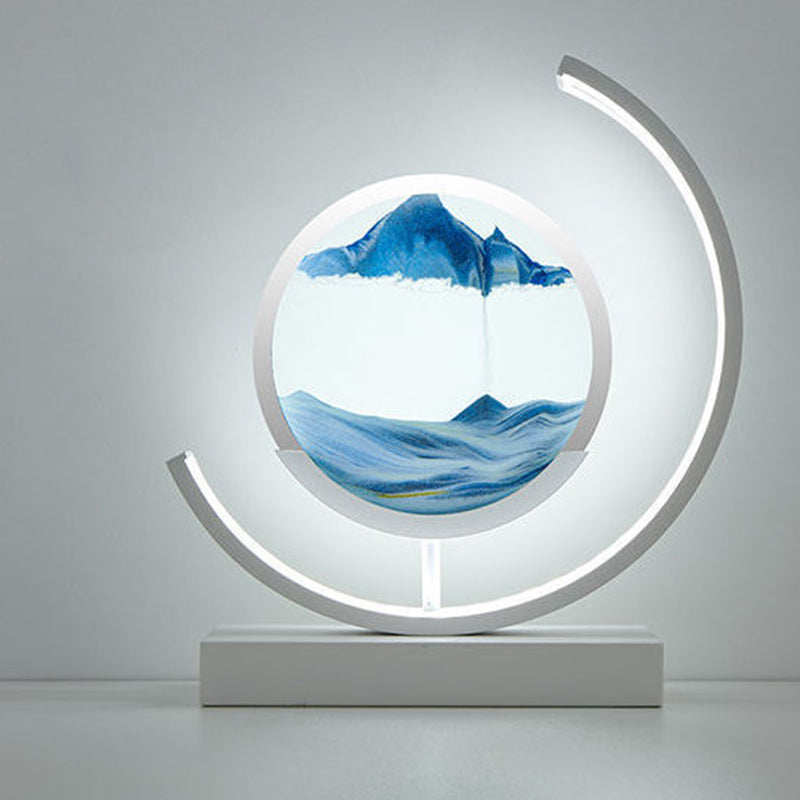 Modern Art Deco Round Quicksand Iron Glass LED Table Lamp For Bedroom
