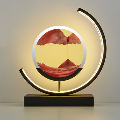 Modern Art Deco Round Quicksand Iron Glass LED Table Lamp For Bedroom