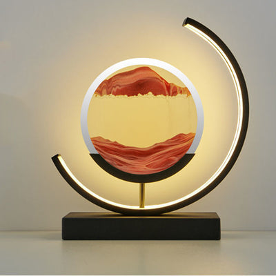 Modern Art Deco Round Quicksand Iron Glass LED Table Lamp For Bedroom
