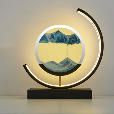 Modern Art Deco Round Quicksand Iron Glass LED Table Lamp For Bedroom