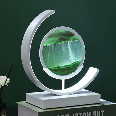 Modern Art Deco Round Quicksand Iron Glass LED Table Lamp For Bedroom