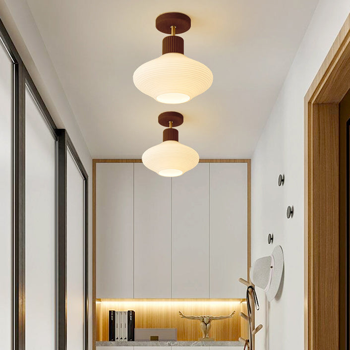 Luz de techo semiempotrada de 1 luz con pantalla de vidrio redonda ovalada de rayas minimalista moderna con marco de madera para pasillo 