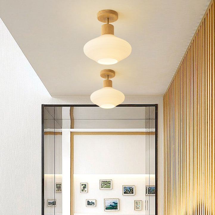 Luz de techo semiempotrada de 1 luz con pantalla de vidrio redonda ovalada de rayas minimalista moderna con marco de madera para pasillo 