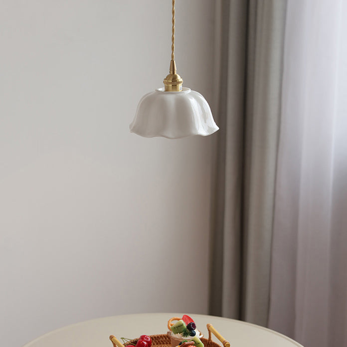Suspension lumineuse moderne minimaliste en laiton rond avec dentelle en céramique à 1 ampoule pour salon 