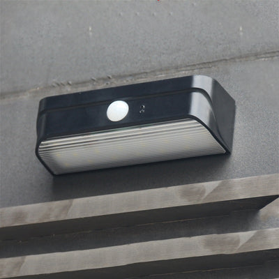 Lampe murale LED en ABS PC rectangulaire étanche à l'eau solaire de simplicité moderne pour patio extérieur 