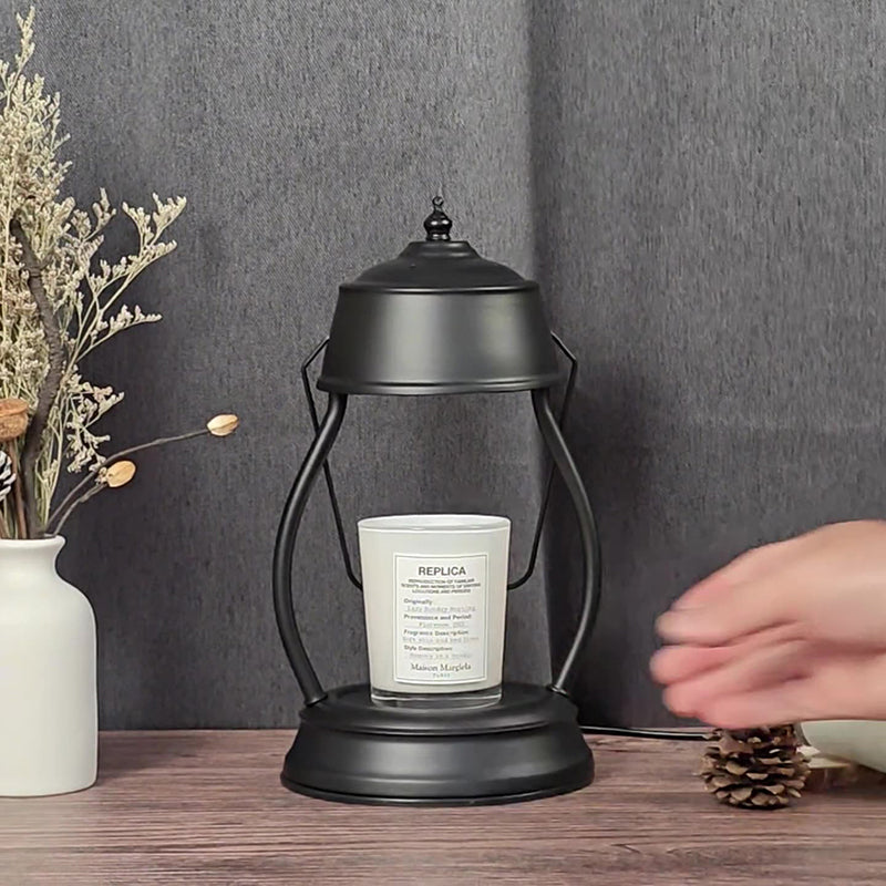 Zeitgenössische kreative runde Laternenform Eisen 1-Licht Aroma Schmelzwachs Tischlampe für Schlafzimmer 