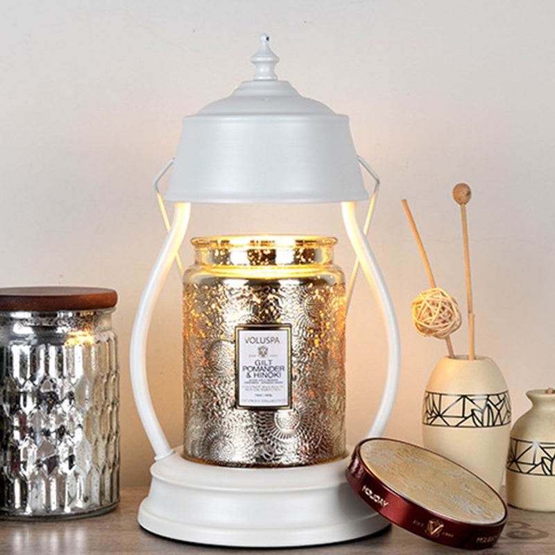 Zeitgenössische kreative runde Laternenform Eisen 1-Licht Aroma Schmelzwachs Tischlampe für Schlafzimmer 