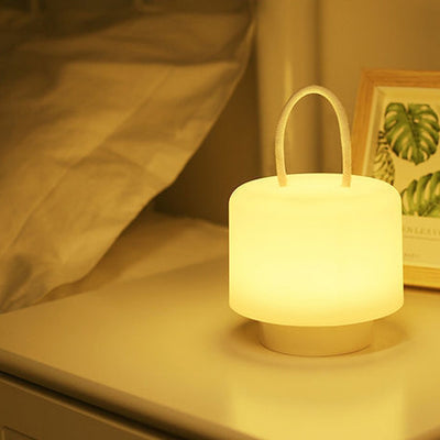 مصباح طاولة LED أسطواني محمول قابل لإعادة الشحن بتصميم حديث وبسيط مصنوع من ABS للغرفة 