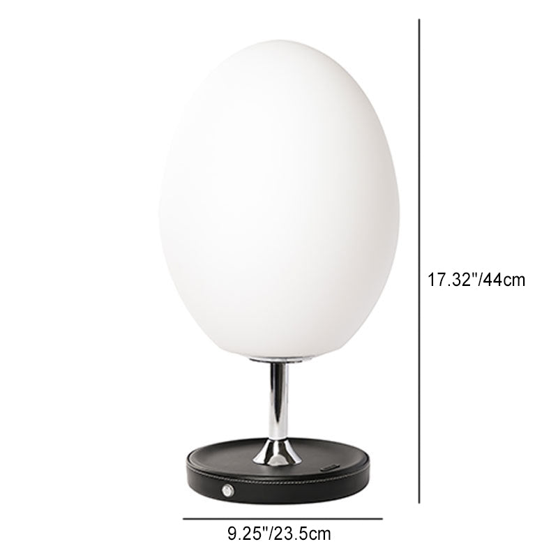 مصباح طاولة LED على شكل بيضة معدني بقاعدة من الجلد وظل زجاجي لغرفة النوم بتصميم حديث وبسيط 