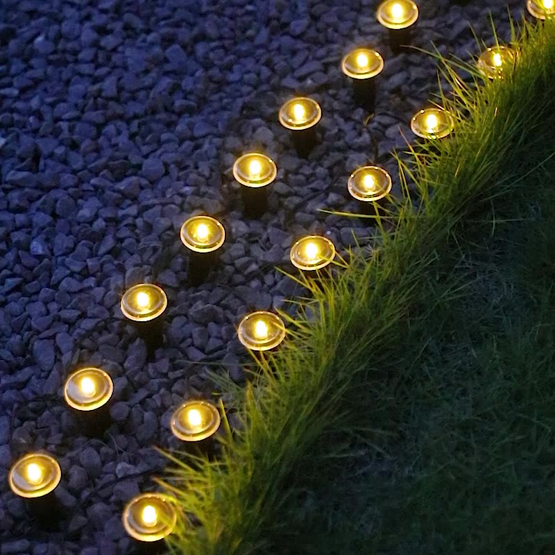 Lumière extérieure moderne minimaliste étanche solaire ronde en acier inoxydable et plastique LED à piquet pour jardin 