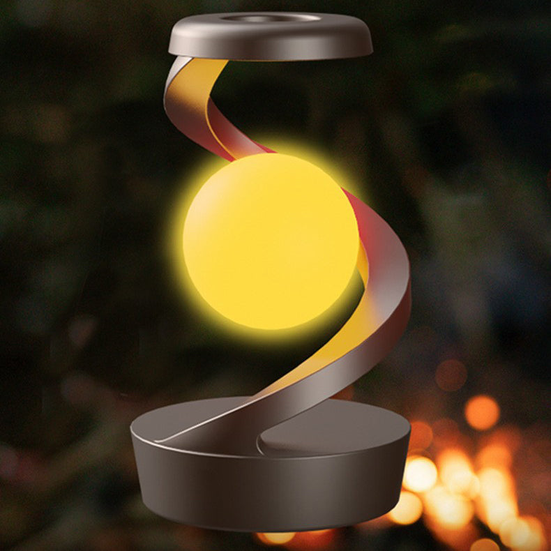 Moderne kreative Orb schwebende rotierende ABS LED Tischlampe für das Schlafzimmer 