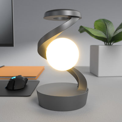 Moderne kreative Orb schwebende rotierende ABS LED Tischlampe für das Schlafzimmer 