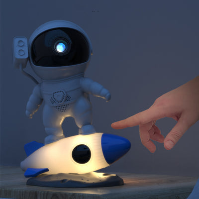Zeitgenössische kreative Raketen-Astronauten-Projektions-PVC-ABS-LED-Tischlampe für das Schlafzimmer 