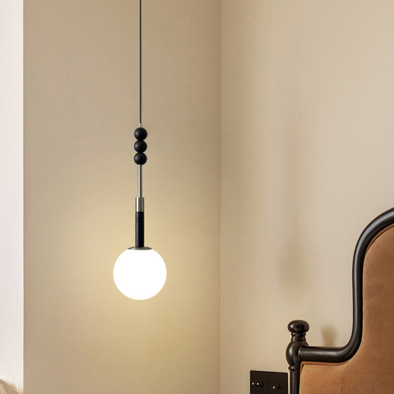 Moderne minimalistische runde Globus-Rundperlen Eisen 1-Licht Pendelleuchte für das Schlafzimmer 