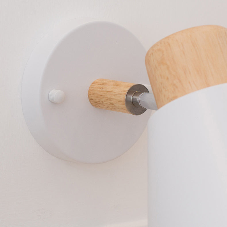 Moderne minimalistische runde Hornform Holz Eisen 1-Licht Wandleuchte für Schlafzimmer 