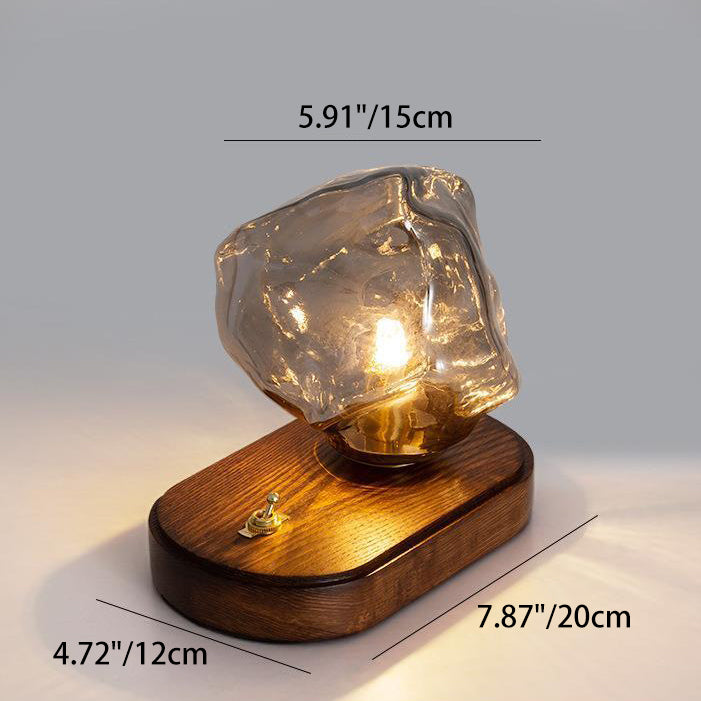 Lámpara de mesa de 1 luz con base ovalada de madera maciza estilo Art Decó moderno y pantalla de vidrio en forma de cubo de hielo para dormitorio 