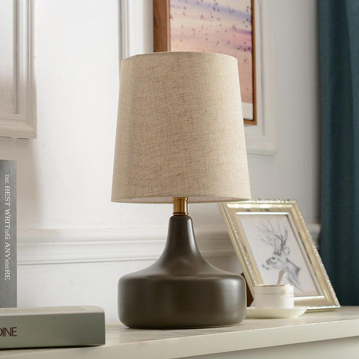 Lampe de table 1 lumière contemporaine scandinave en laiton céramique tissu abat-jour cylindrique effilé pour chambre et bureau 