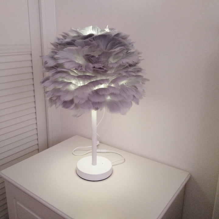 Zeitgenössische nordische ovale 1-flammige Tischlampe mit Eisenfeder für Wohnzimmer 