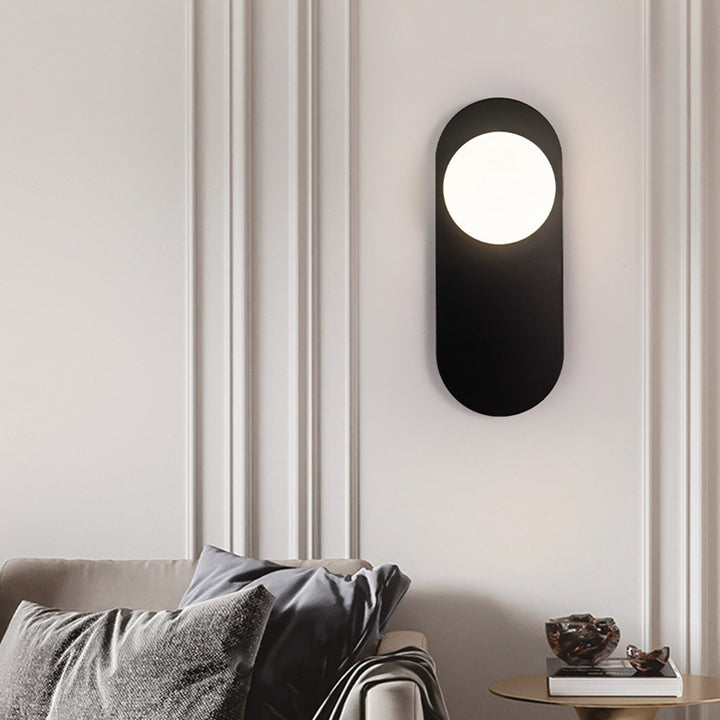 Zeitgenössische kreative ovale Eisen-Glas-Wandleuchte mit 1 Licht für das Wohnzimmer 