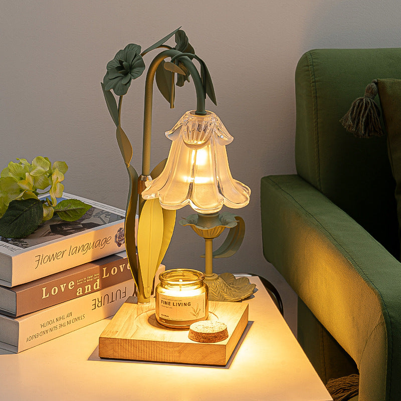 Zeitgenössische skandinavische Blumen Eisen Holz Glas 1-Licht Schmelzwachs Tischlampe für Wohnzimmer 