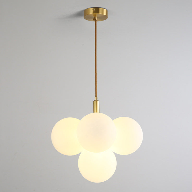 Zeitgenössische nordische Globus-Kupfer-Glas 5-Licht Pendelleuchte für das Wohnzimmer 