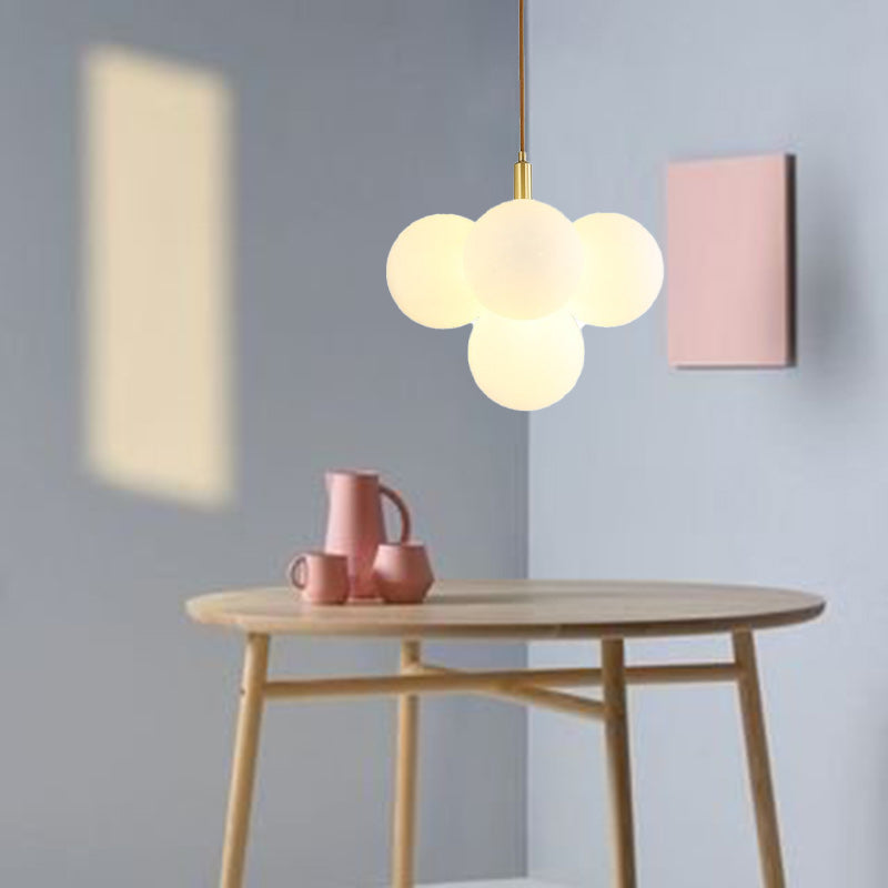 Zeitgenössische nordische Globus-Kupfer-Glas 5-Licht Pendelleuchte für das Wohnzimmer 