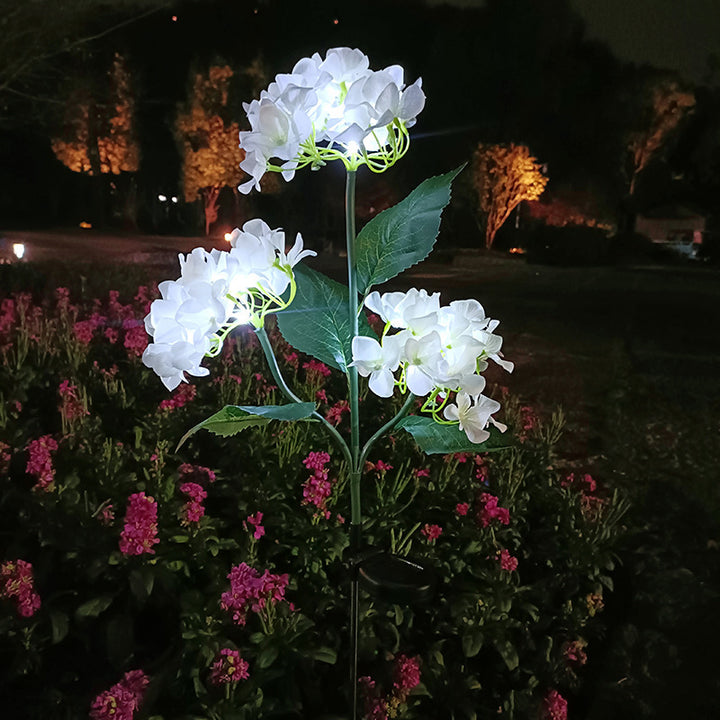 現代的なクリエイティブクロス人工花LEDソーラー防水芝生挿入ライト屋外パティオ用 