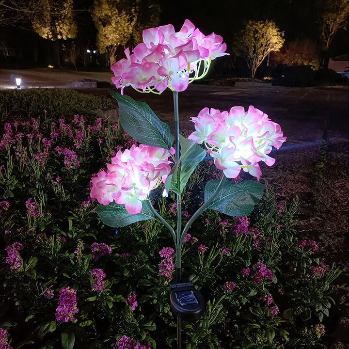 現代的なクリエイティブクロス人工花LEDソーラー防水芝生挿入ライト屋外パティオ用 