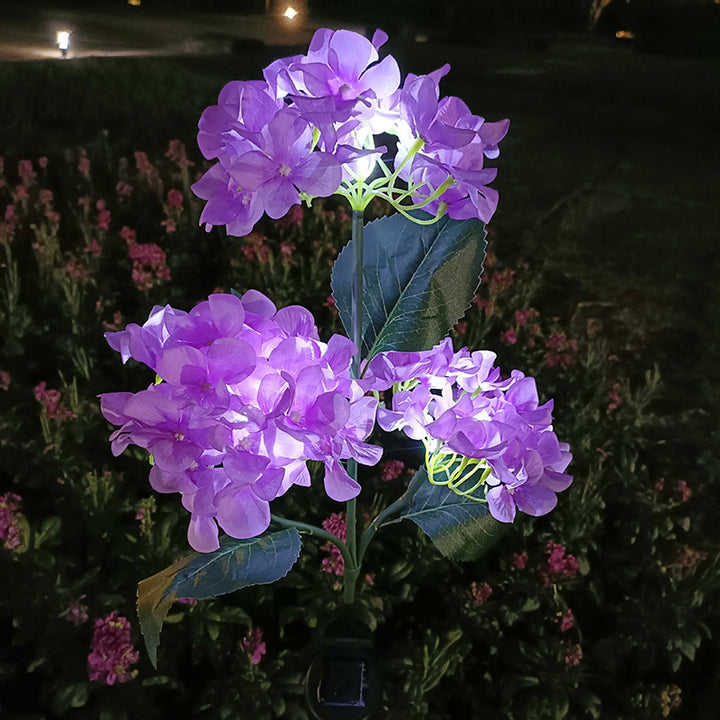 現代的なクリエイティブクロス人工花LEDソーラー防水芝生挿入ライト屋外パティオ用 