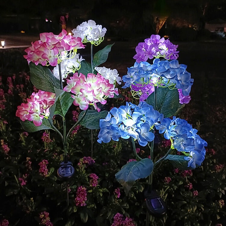 現代的なクリエイティブクロス人工花LEDソーラー防水芝生挿入ライト屋外パティオ用 