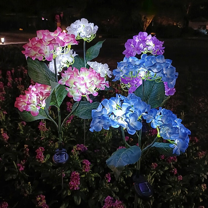 現代的なクリエイティブクロス人工花LEDソーラー防水芝生挿入ライト屋外パティオ用 