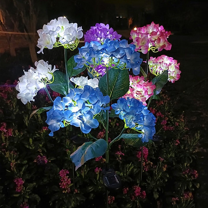 現代的なクリエイティブクロス人工花LEDソーラー防水芝生挿入ライト屋外パティオ用 