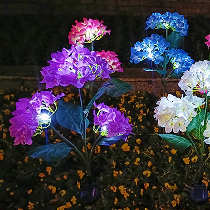 現代的なクリエイティブクロス人工花LEDソーラー防水芝生挿入ライト屋外パティオ用 