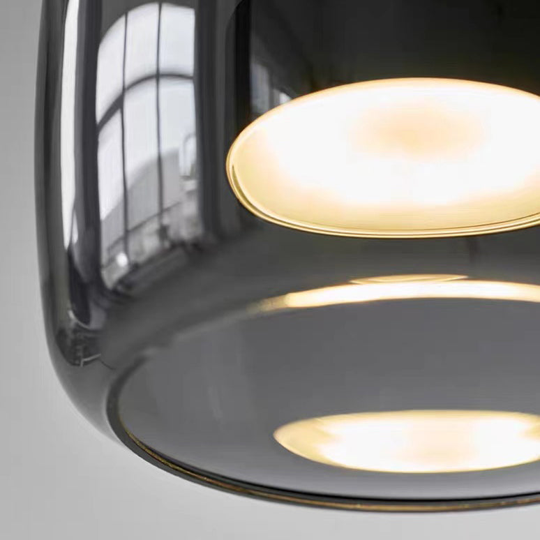 Lustre suspendu moderne de luxe en cylindre de verre transparent avec LED en fer pour chambre 