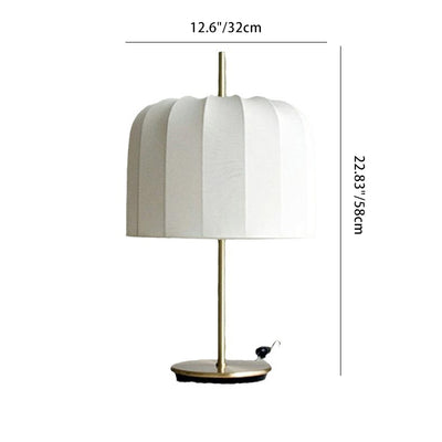 مصباح طاولة بلمسة عصرية ومصمم بشكل بسيط بقاعدة حديدية وقماش على شكل يقطينة بإضاءة واحدة لغرفة النوم 