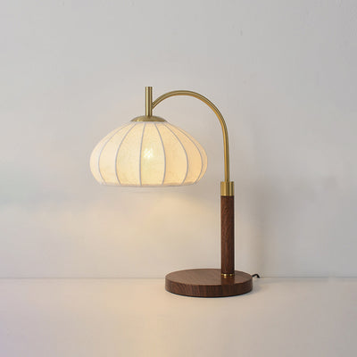 Traditionelle chinesische runde ovale Kegelblumenmuster Eisenstoff 1-Licht Tischlampe für das Schlafzimmer 
