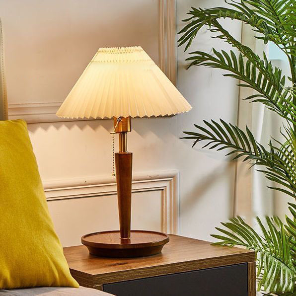 Zeitgenössische Retro-Zugkordel Tischlampe mit rundem Sockel und plissiertem Leinen, 1-Licht für das Schlafzimmer 