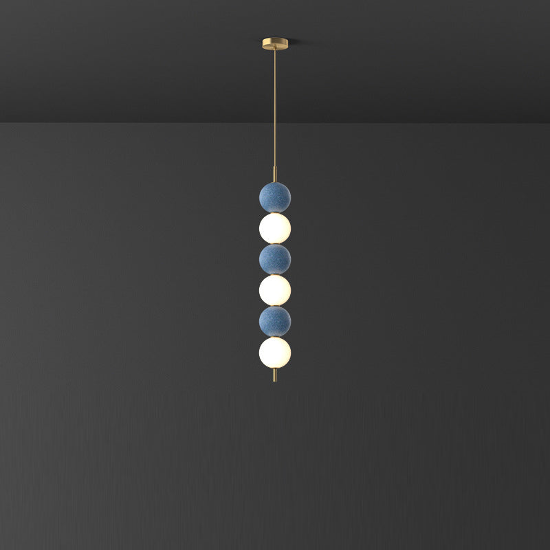 Moderne minimalistische vertikale String-Kugel Messing Acryl LED Pendelleuchte für das Schlafzimmer 