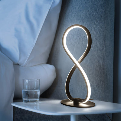 Moderne minimalistische 8-förmige Aluminium-Silikon-LED-Tischlampe für das Wohnzimmer 
