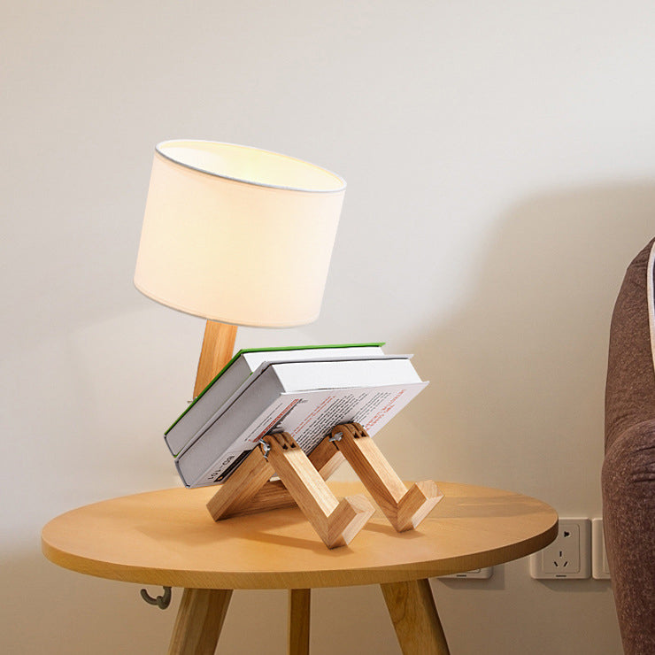 Zeitgenössische kreative verstellbare Roboterform Holzsockel Zylinder Stoff 1-Licht Tischlampe für das Wohnzimmer 