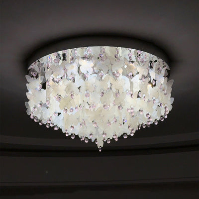Lustre encastré LED en forme de papillon en cristal créatif contemporain en acier inoxydable avec carillon éolien en coquillage pour chambre à coucher 