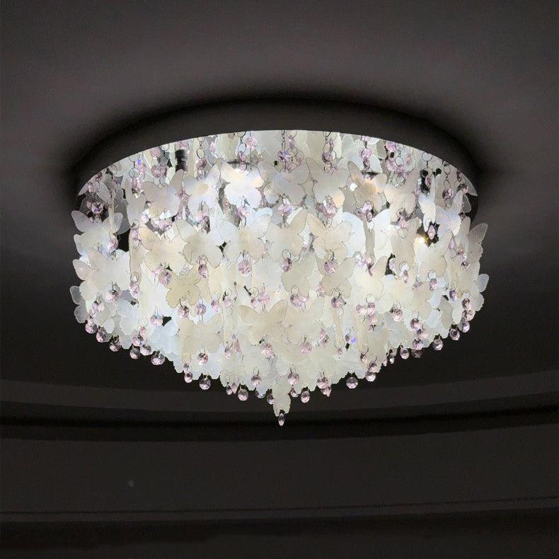 Lustre encastré LED en forme de papillon en cristal créatif contemporain en acier inoxydable avec carillon éolien en coquillage pour chambre à coucher 