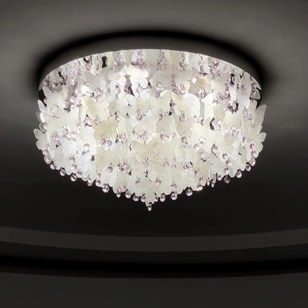 Lustre encastré LED en forme de papillon en cristal créatif contemporain en acier inoxydable avec carillon éolien en coquillage pour chambre à coucher 