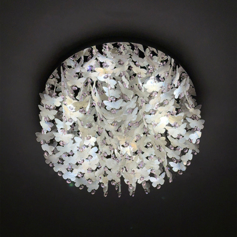 Lustre encastré LED en forme de papillon en cristal créatif contemporain en acier inoxydable avec carillon éolien en coquillage pour chambre à coucher 