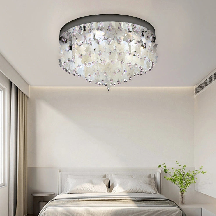 Lustre encastré LED en forme de papillon en cristal créatif contemporain en acier inoxydable avec carillon éolien en coquillage pour chambre à coucher 