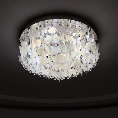 Lustre encastré LED en forme de papillon en cristal créatif contemporain en acier inoxydable avec carillon éolien en coquillage pour chambre à coucher 