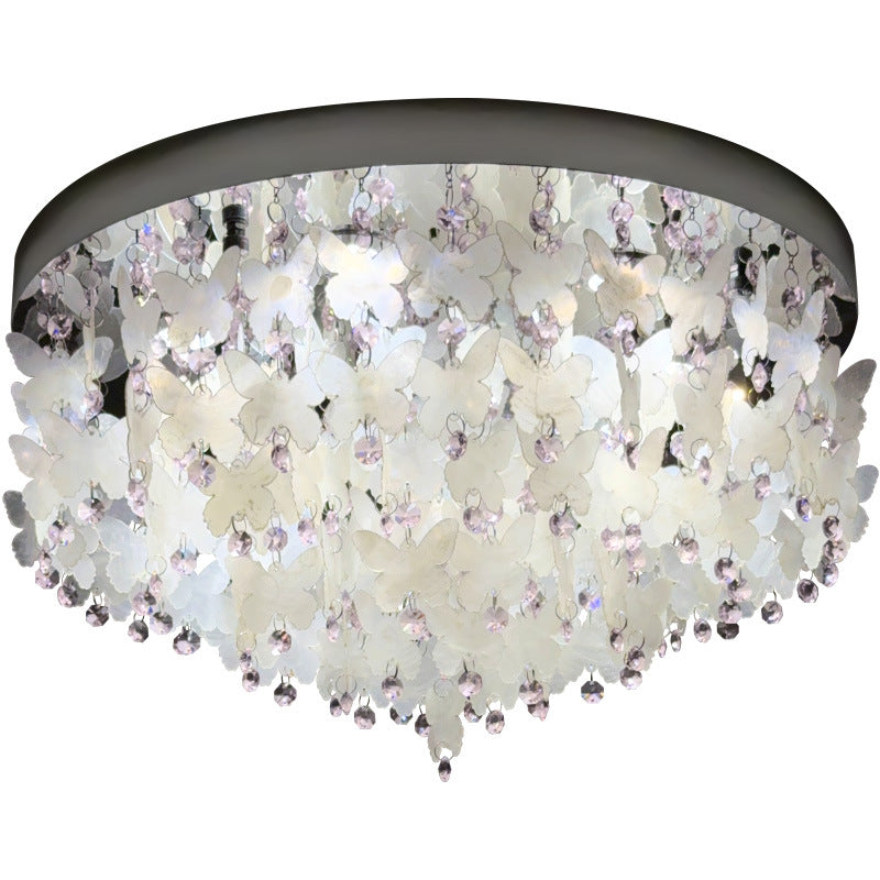 Lustre encastré LED en forme de papillon en cristal créatif contemporain en acier inoxydable avec carillon éolien en coquillage pour chambre à coucher 