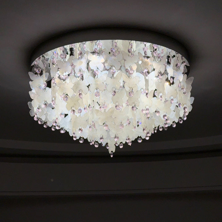 Lustre encastré LED en forme de papillon en cristal créatif contemporain en acier inoxydable avec carillon éolien en coquillage pour chambre à coucher 